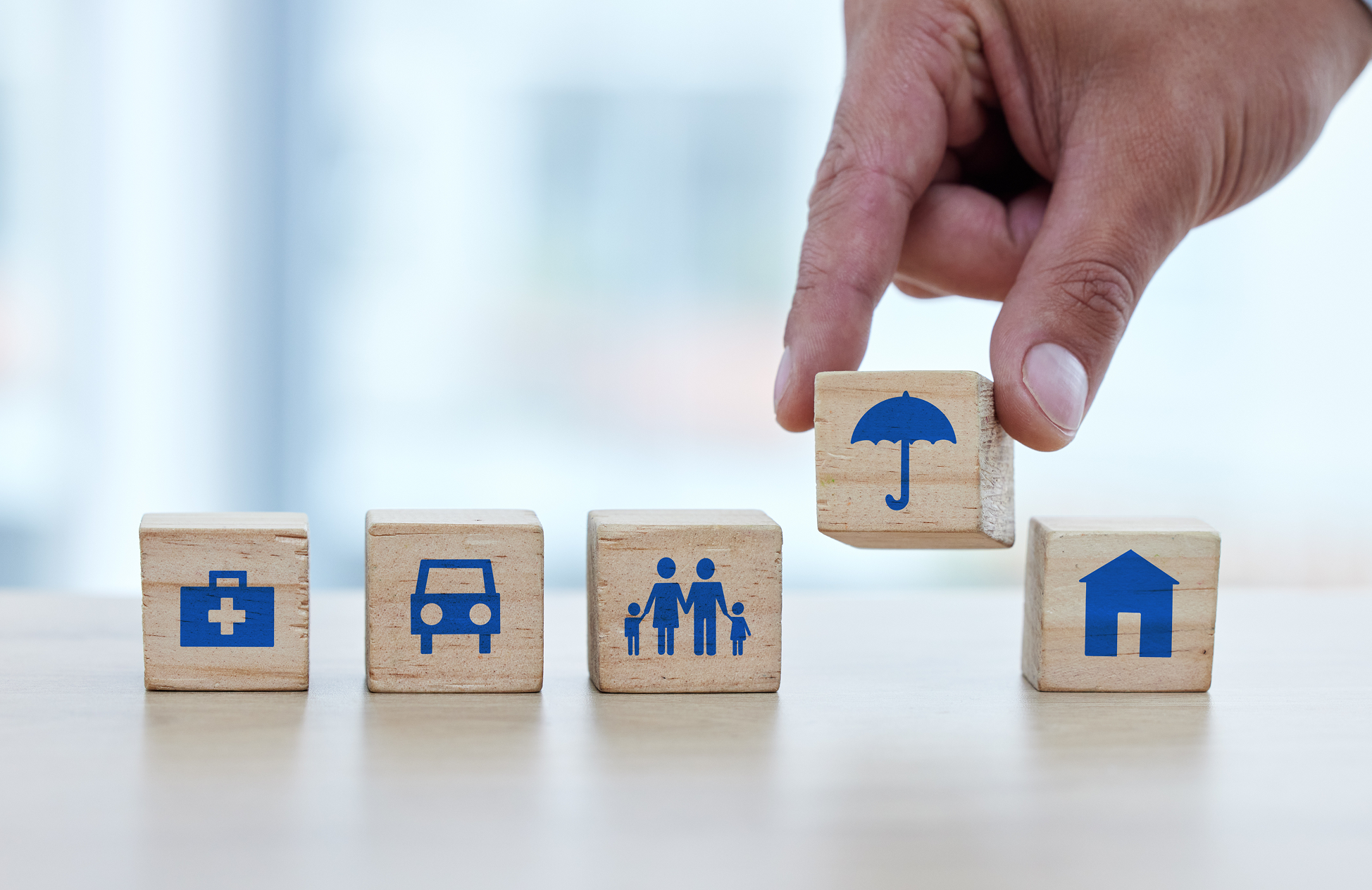 Symbols of healthcare, car, family, umbrella, house.