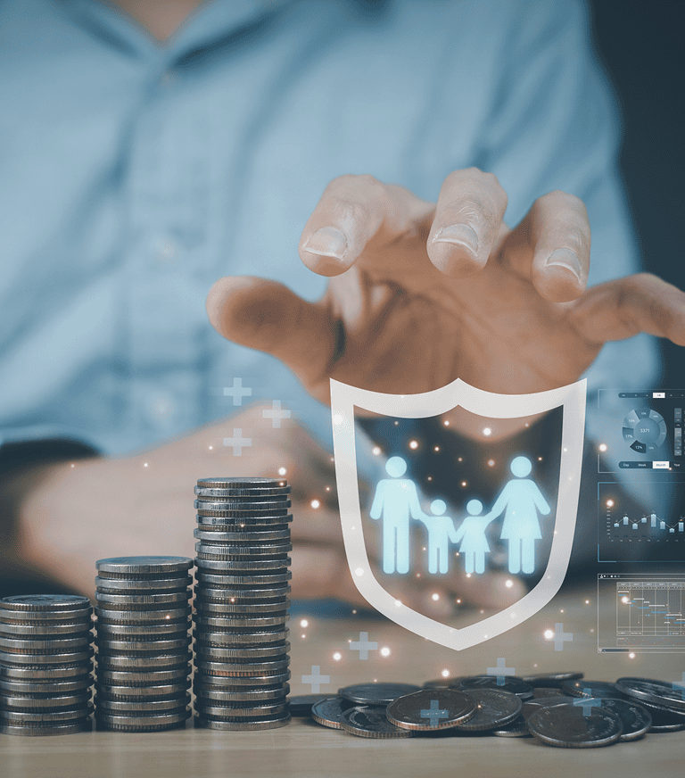 A person in a blue shirt gestures towards a digital shield icon with family figures, surrounded by stacks of coins and financial charts.